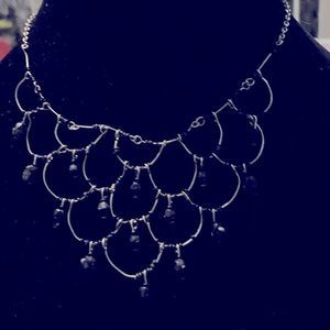 Beautiful Silver collar necklace with beautiful faceted black beads.